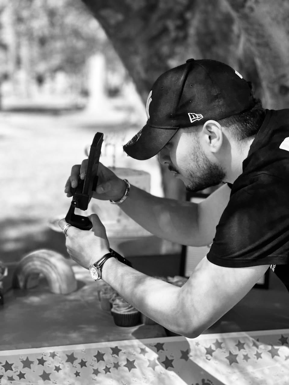 Founder behind the camera capturing a shot